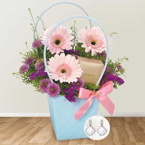 Earrings And Floral Arrangement For Mom